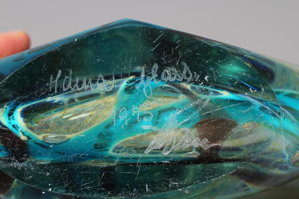 A MDINA GLASS ICE CUT FISH VASE, 1975, with brown, amber and turquoise internal striations, Image