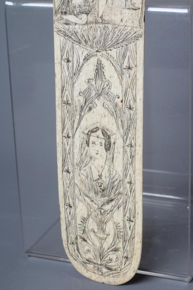 AN EARLY 19TH CENTURY BONE BUSK, the fascia incised and stained black with a brigand holding a loft Image