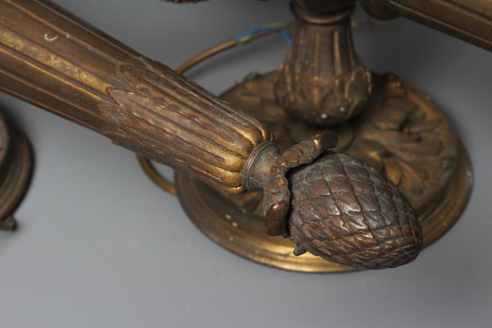 A PAIR OF GILT METAL TORCH WALL LIGHTS Image