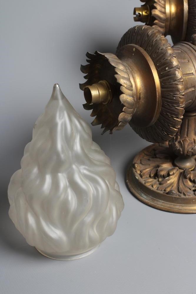 A PAIR OF GILT METAL TORCH WALL LIGHTS Image