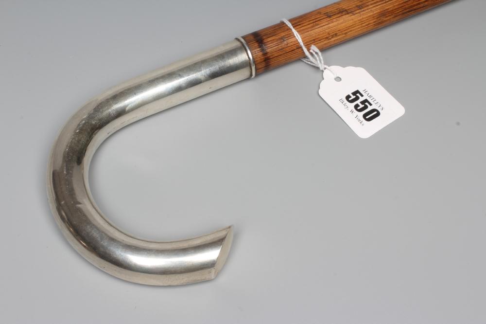 AN EARLY 20TH CENTURY SWEDISH SILVER CROOK HANDLE WALKING STICK, Sweden, 1915, makers mark SPH, on a Image
