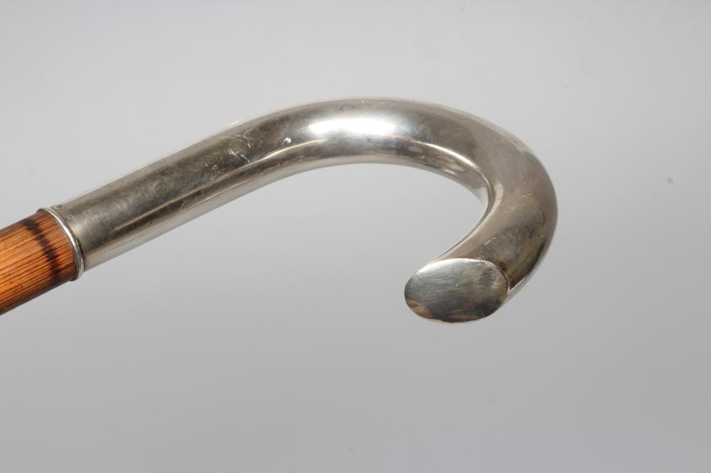AN EARLY 20TH CENTURY SWEDISH SILVER CROOK HANDLE WALKING STICK, Sweden, 1915, makers mark SPH, on a Image