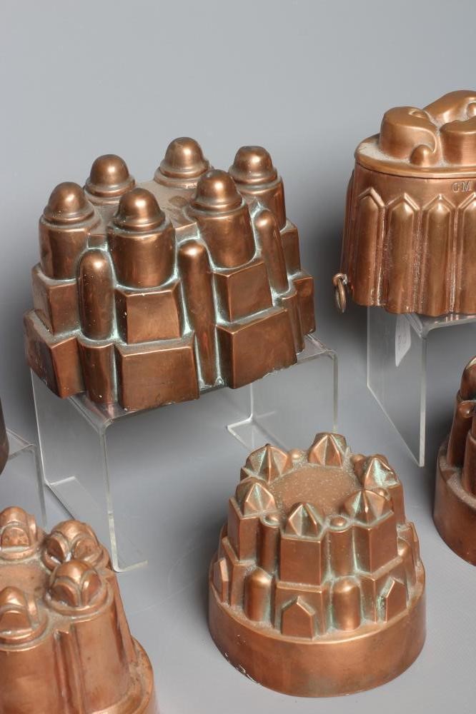 EIGHT VICTORIAN COPPER JELLY MOULDS comprising six circular examples Image