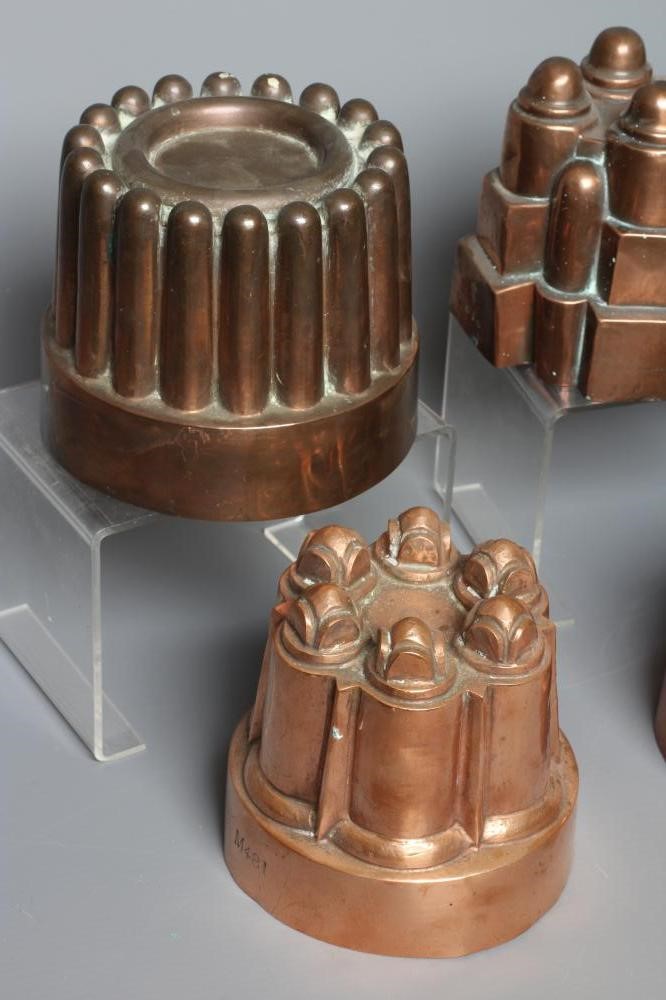 EIGHT VICTORIAN COPPER JELLY MOULDS comprising six circular examples Image