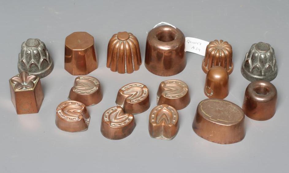 SIXTEEN MINIATURE VICTORIAN COPPER JELLY AND FOOD MOULDS, with shapes including horseshoes, turrets, Image
