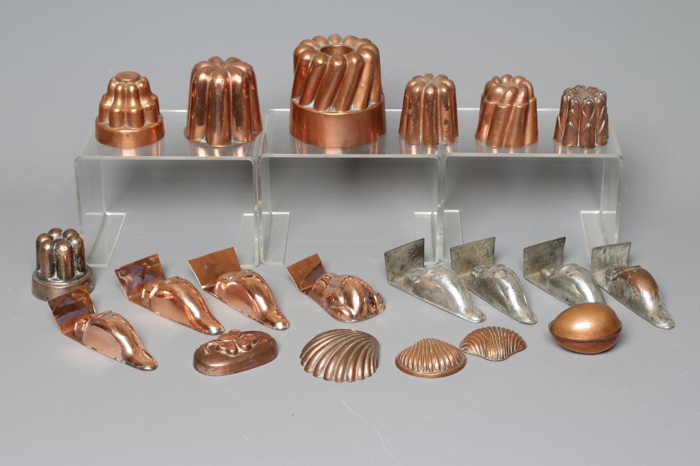 TWENTY MINIATURE VICTORIAN JELLY AND FOOD MOULDS, with shapes including angled and straight turrets, Image