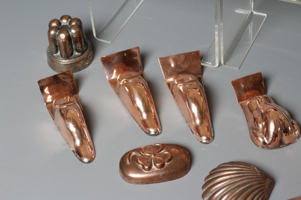 TWENTY MINIATURE VICTORIAN JELLY AND FOOD MOULDS, with shapes including angled and straight turrets, Image