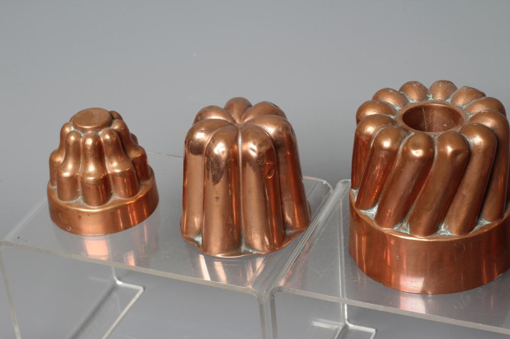TWENTY MINIATURE VICTORIAN JELLY AND FOOD MOULDS, with shapes including angled and straight turrets, Image