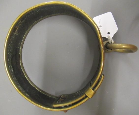 A LARGE 19TH CENTURY BRASS DOG COLLAR, un-named, plain circular with swivel loop and Victorian brass Image