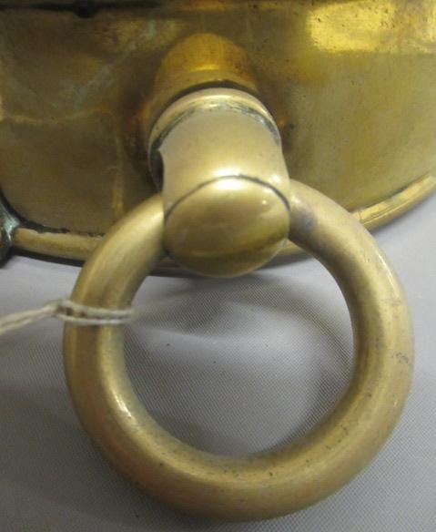 A LARGE 19TH CENTURY BRASS DOG COLLAR, un-named, plain circular with swivel loop and Victorian brass Image