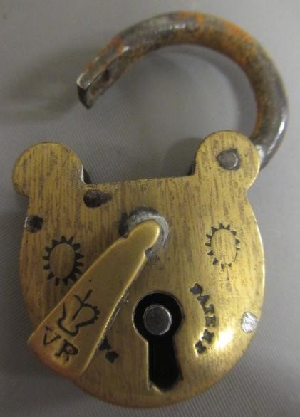 A LARGE 19TH CENTURY BRASS DOG COLLAR, un-named, plain circular with swivel loop and Victorian brass Image