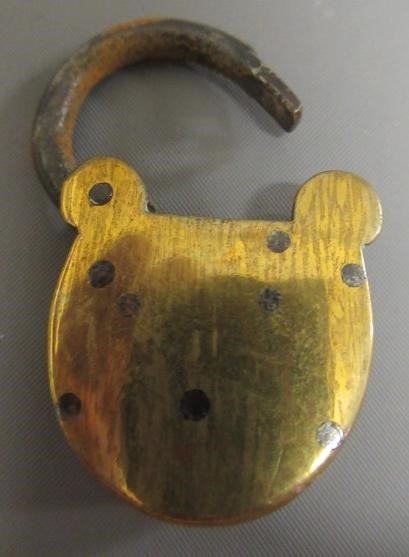 A LARGE 19TH CENTURY BRASS DOG COLLAR, un-named, plain circular with swivel loop and Victorian brass Image