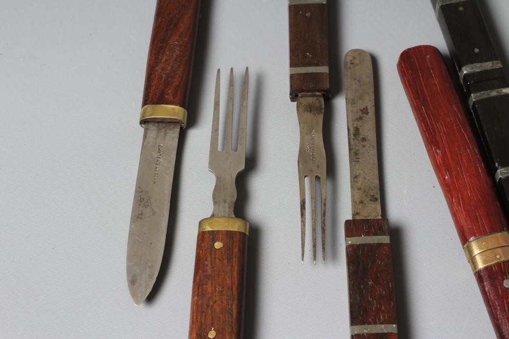 FOURTEEN LATE 19TH AND EARLY 20TH CENTURY OFFICER'S CAMPAIGN KNIFE AND FORK SETS Image