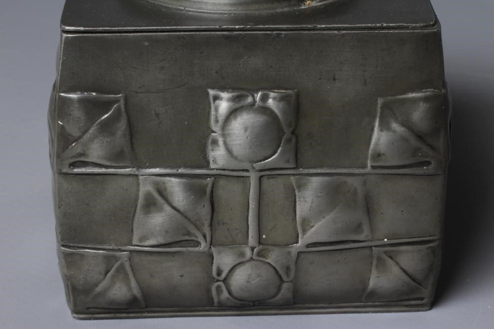 ARCHIBALD KNOX (1864-1933) A PEWTER BISCUIT BARREL, c.1900, stamped 'TUDRIC, 0194' and embossed with Image