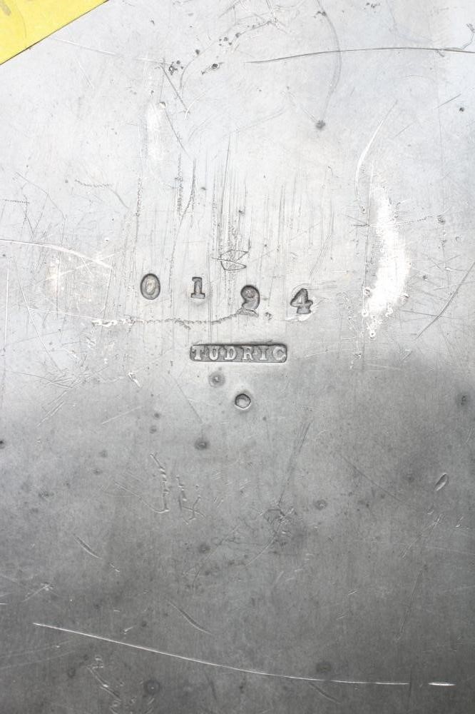 ARCHIBALD KNOX (1864-1933) A PEWTER BISCUIT BARREL, c.1900, stamped 'TUDRIC, 0194' and embossed with Image