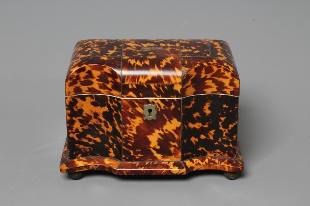 A REGENCY TORTOISESHELL SERPENTINE TEA CADDY with wire stringing and metal escutcheon and vacant Image