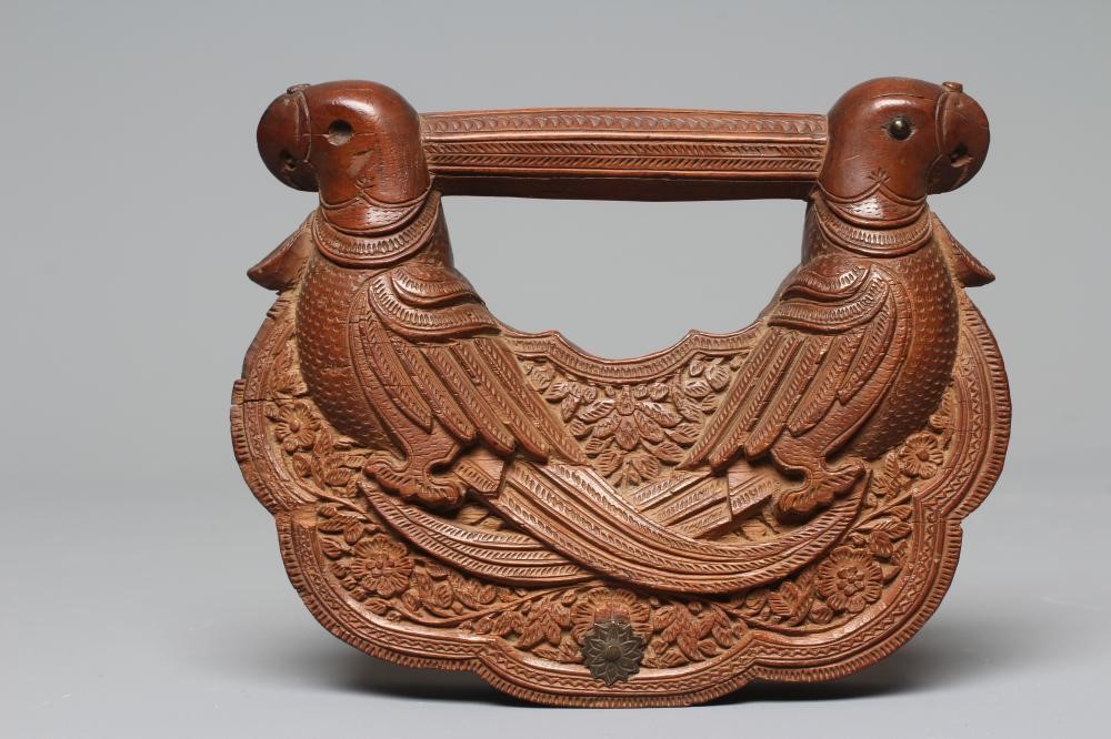 A 19TH CENTURY MYSORE CARVED SANDALWOOD FAN HANDLE with two parrots carved to each side and each Image