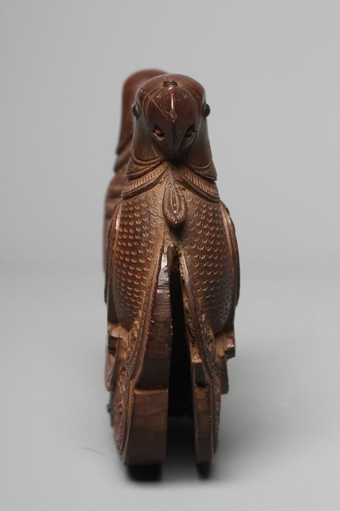 A 19TH CENTURY MYSORE CARVED SANDALWOOD FAN HANDLE with two parrots carved to each side and each Image
