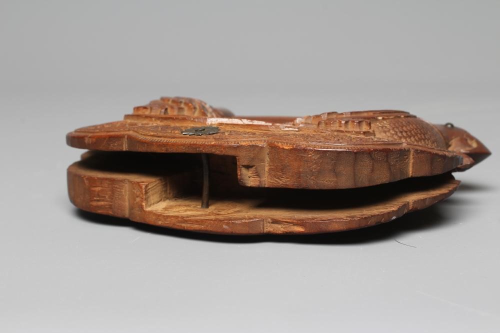 A 19TH CENTURY MYSORE CARVED SANDALWOOD FAN HANDLE with two parrots carved to each side and each Image