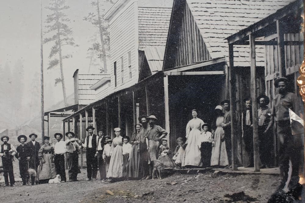 A 19TH CENTURY AMERICAN AMBROTYPE OF DOWNIEVILLE, CALIFORNIA in a gilt tooled dark brown Image