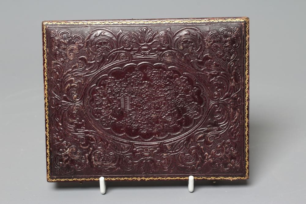 A 19TH CENTURY AMERICAN AMBROTYPE OF DOWNIEVILLE, CALIFORNIA in a gilt tooled dark brown Image