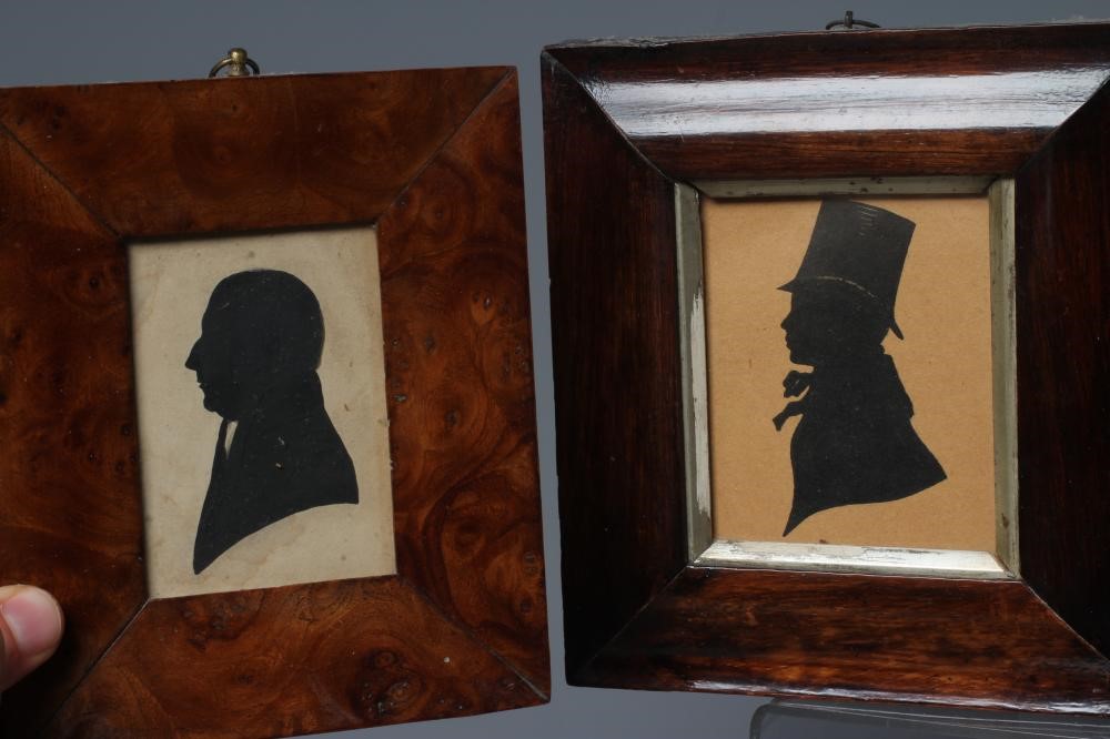 A PAIR OF EARLY 20TH CENTURY SILHOUETTES OF A LADY AND A GENTLEMAN in period Georgian costume Image