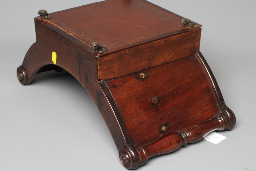 A GEORGE III MAHOGANY CHEESE COASTER of oblong dished form with two divisions and column turned Image