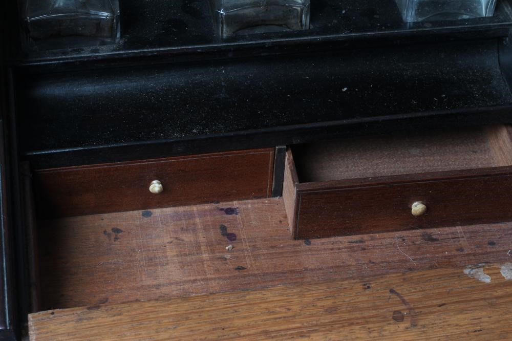 A 19TH CENTURY ROLL TOP WRITING SLOPE Image