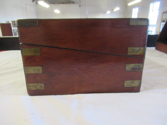 A 19TH CENTURY MAHOGANY BRASS BOUND CAMPAIGN WRITING SLOPE Image