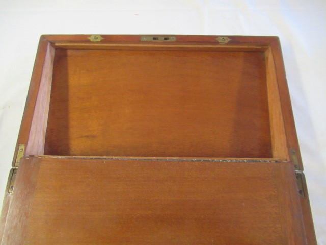 A 19TH CENTURY MAHOGANY BRASS BOUND CAMPAIGN WRITING SLOPE Image