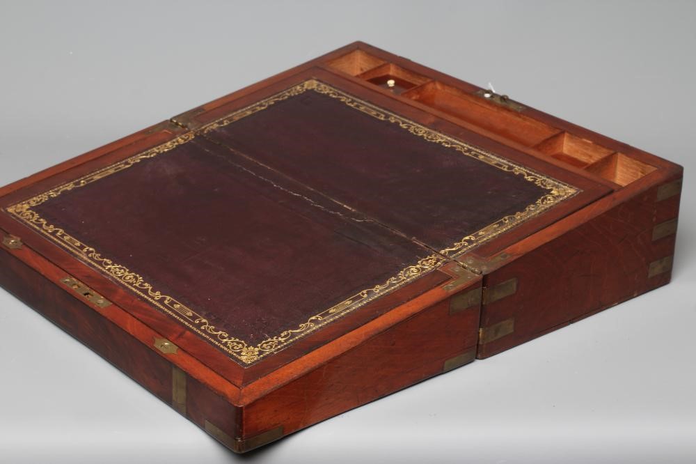A 19TH CENTURY MAHOGANY BRASS BOUND CAMPAIGN WRITING SLOPE Image