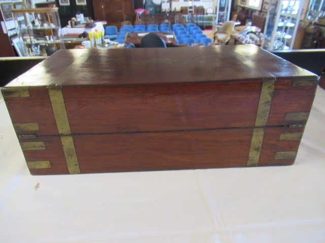 A 19TH CENTURY MAHOGANY BRASS BOUND CAMPAIGN WRITING SLOPE Image