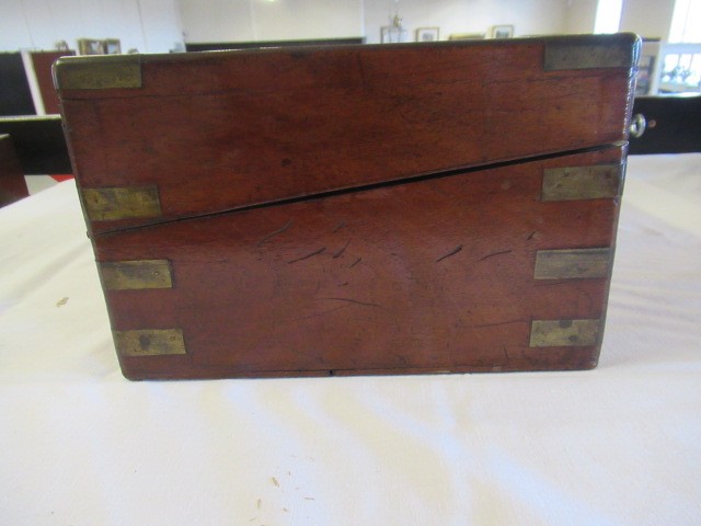 A 19TH CENTURY MAHOGANY BRASS BOUND CAMPAIGN WRITING SLOPE Image