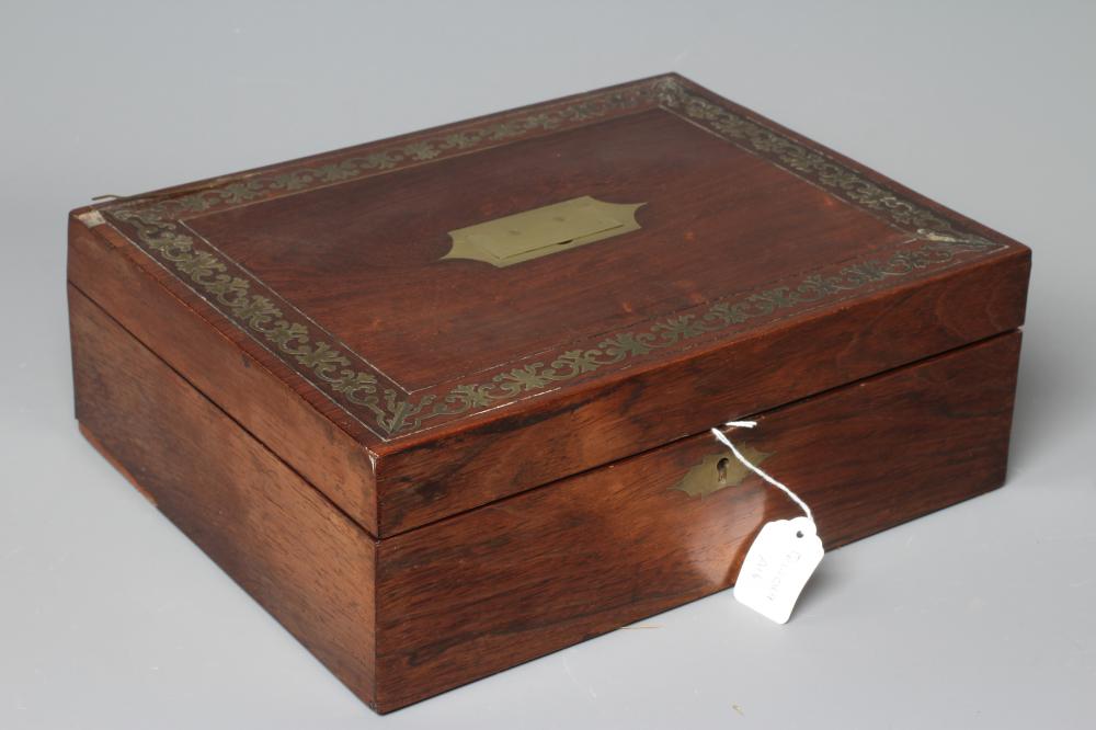 A 19TH CENTURY ROSEWOOD WRITING/VANITY BOX Image