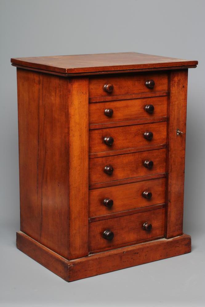 A 19TH CENTURY MAHOGANY TABLE TOP WELLINGTON CHEST, the oblong top over six long graduating drawers Image