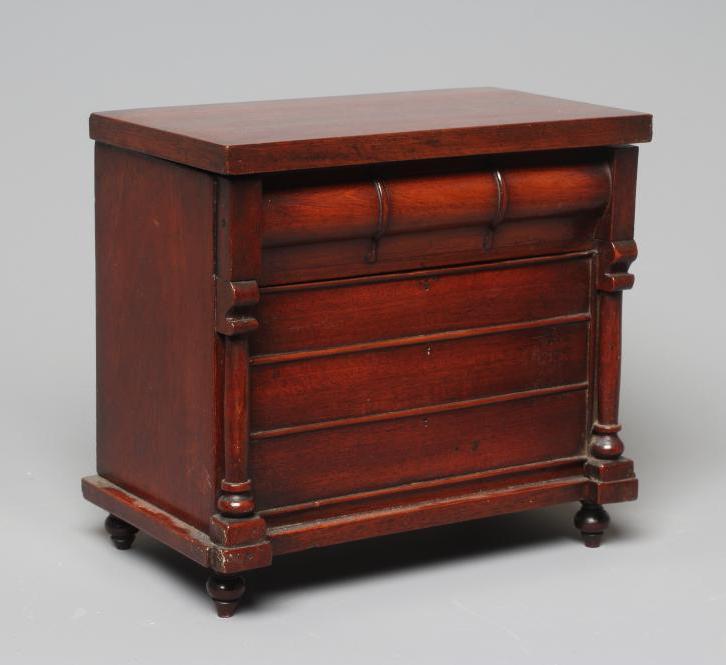 A MINIATURE MAHOGANY SCOTTISH CHEST OF DRAWERS Image
