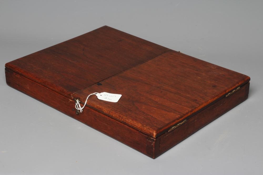 A 19TH CENTURY FOLDING CAMPAIGN TOILET MIRROR, the oblong plate in a moulded frame folding into a Image