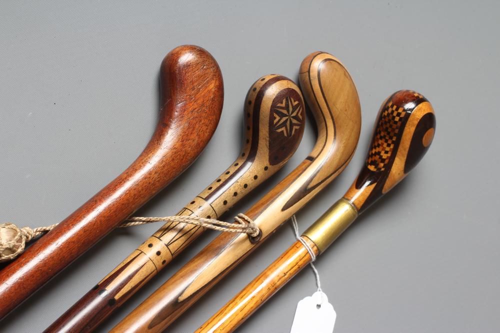 AN EARLY 20TH CENTURY MARQUETRY INLAID PISTOL GRIP WALKING STICK Image
