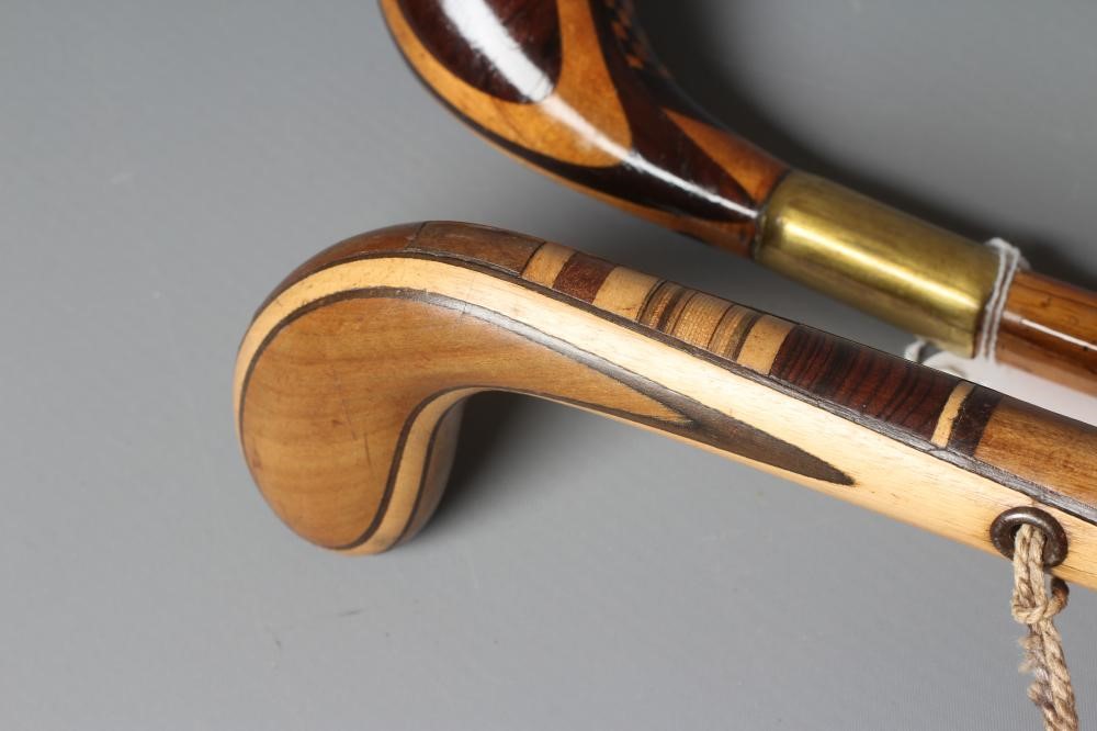 AN EARLY 20TH CENTURY MARQUETRY INLAID PISTOL GRIP WALKING STICK Image
