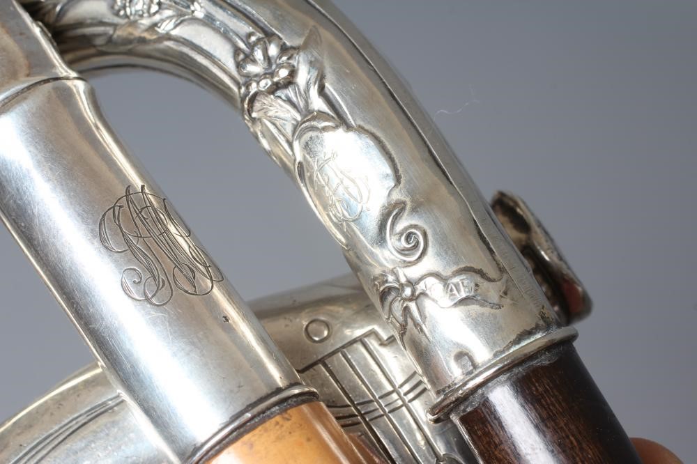 A GERMAN SILVER CRUTCH HANDLE WALKING STICK with Art Nouveau style embossed decoration Image