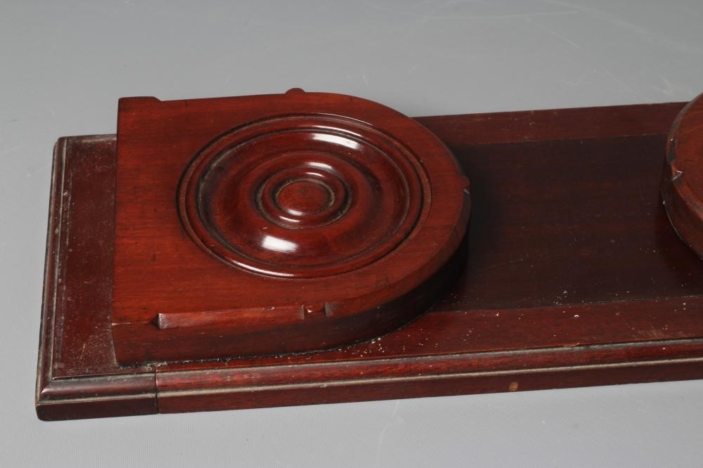 A LATE 19TH CENTURY MAHOGANY BOOK SLIDE with turned supports, 29" long fully extended Image