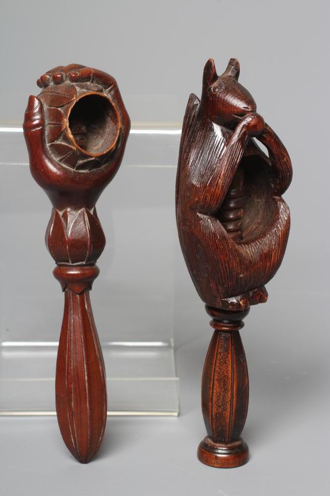 A 19TH CENTURY WALNUT SCREW TYPE NUTCRACKER Image