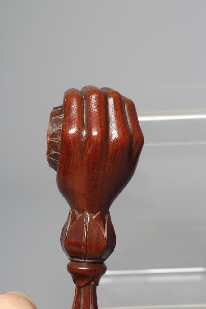 A 19TH CENTURY WALNUT SCREW TYPE NUTCRACKER Image