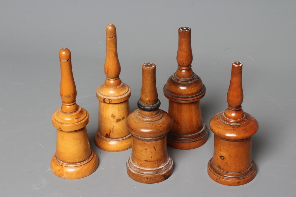 FIVE 19TH CENTURY TREEN GLOVE POWDERERS, all of three sections, two with one hole and three with Image