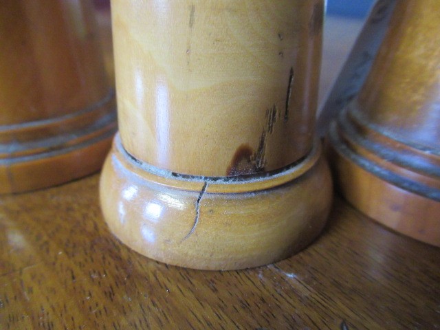 FIVE 19TH CENTURY TREEN GLOVE POWDERERS, all of three sections, two with one hole and three with Image