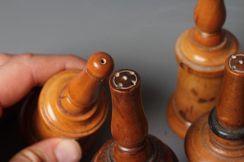 FIVE 19TH CENTURY TREEN GLOVE POWDERERS, all of three sections, two with one hole and three with Image