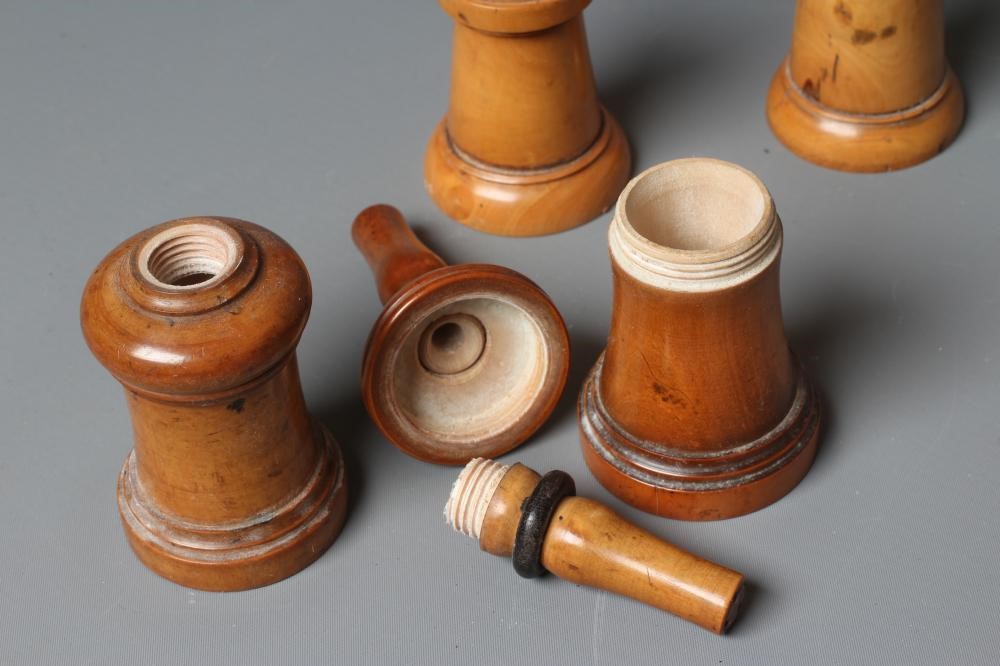 FIVE 19TH CENTURY TREEN GLOVE POWDERERS, all of three sections, two with one hole and three with Image