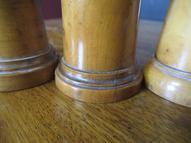 FIVE 19TH CENTURY TREEN GLOVE POWDERERS, all of three sections, two with one hole and three with Image