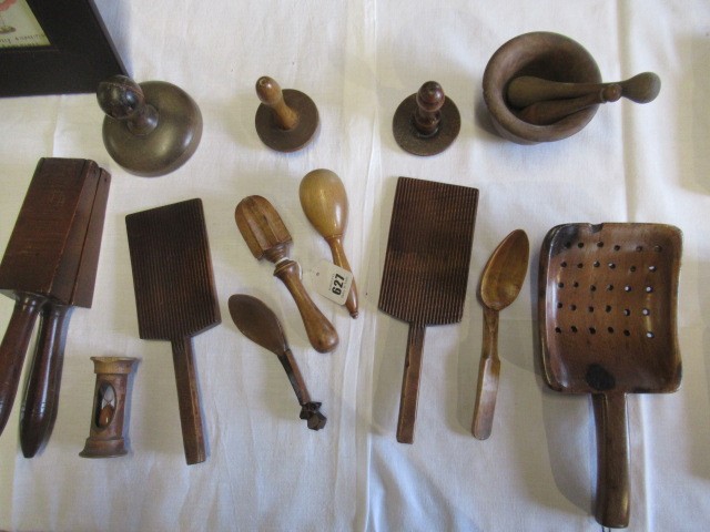 A COLLECTION OF 19TH CENTURY TREEN KITCHENALIA, comprising of a butter spoon, lemon squeezer, butter Image