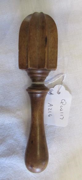 A COLLECTION OF 19TH CENTURY TREEN KITCHENALIA, comprising of a butter spoon, lemon squeezer, butter Image